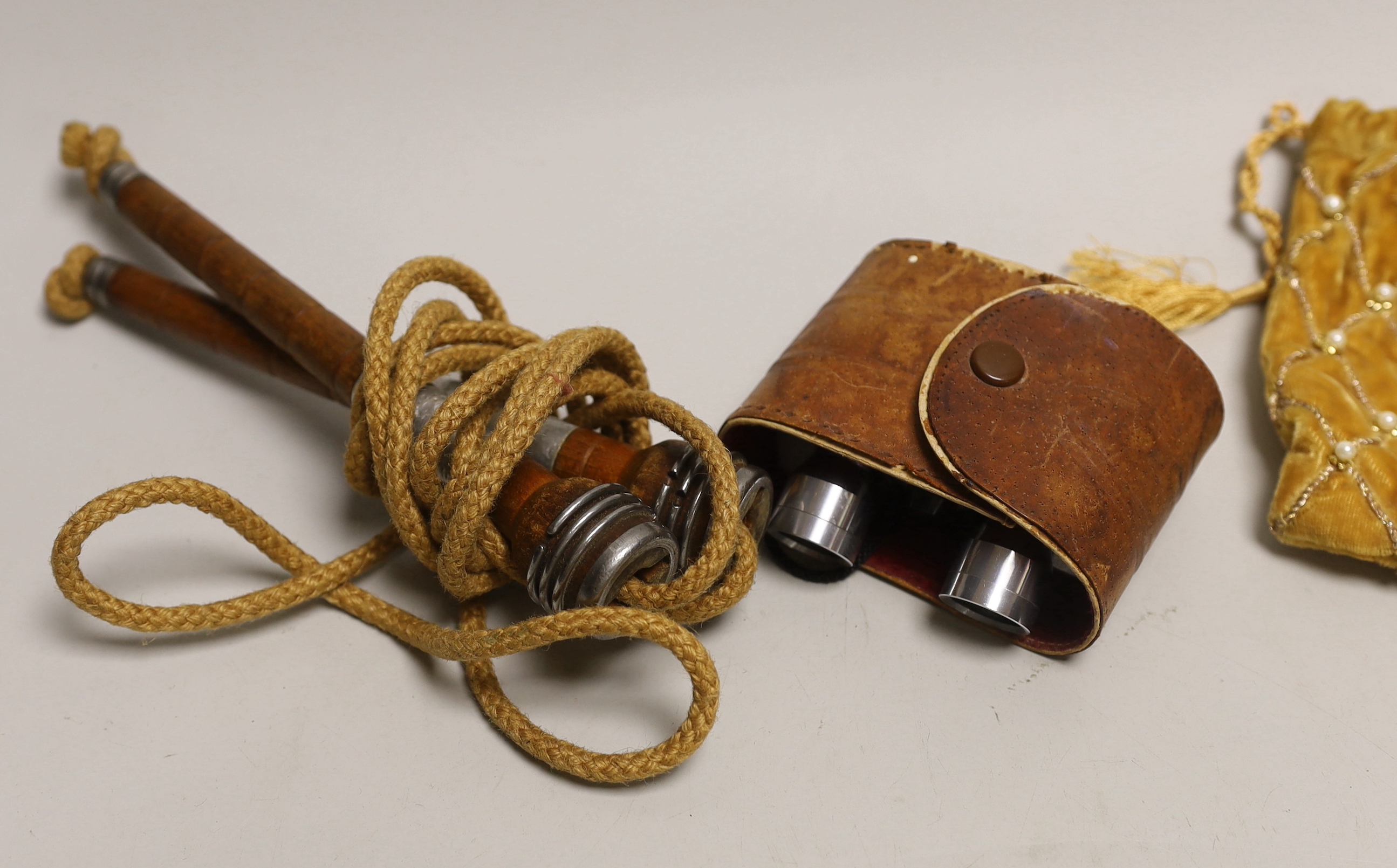 A group of mixed collectables to include a group of various coins such as crowns, half crowns and shillings, opera glasses, a skipping rope, Chinese enamelled pin dishes, fans etc.